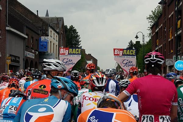 Riders gather at the start line in the sleepy village of Perwez.
