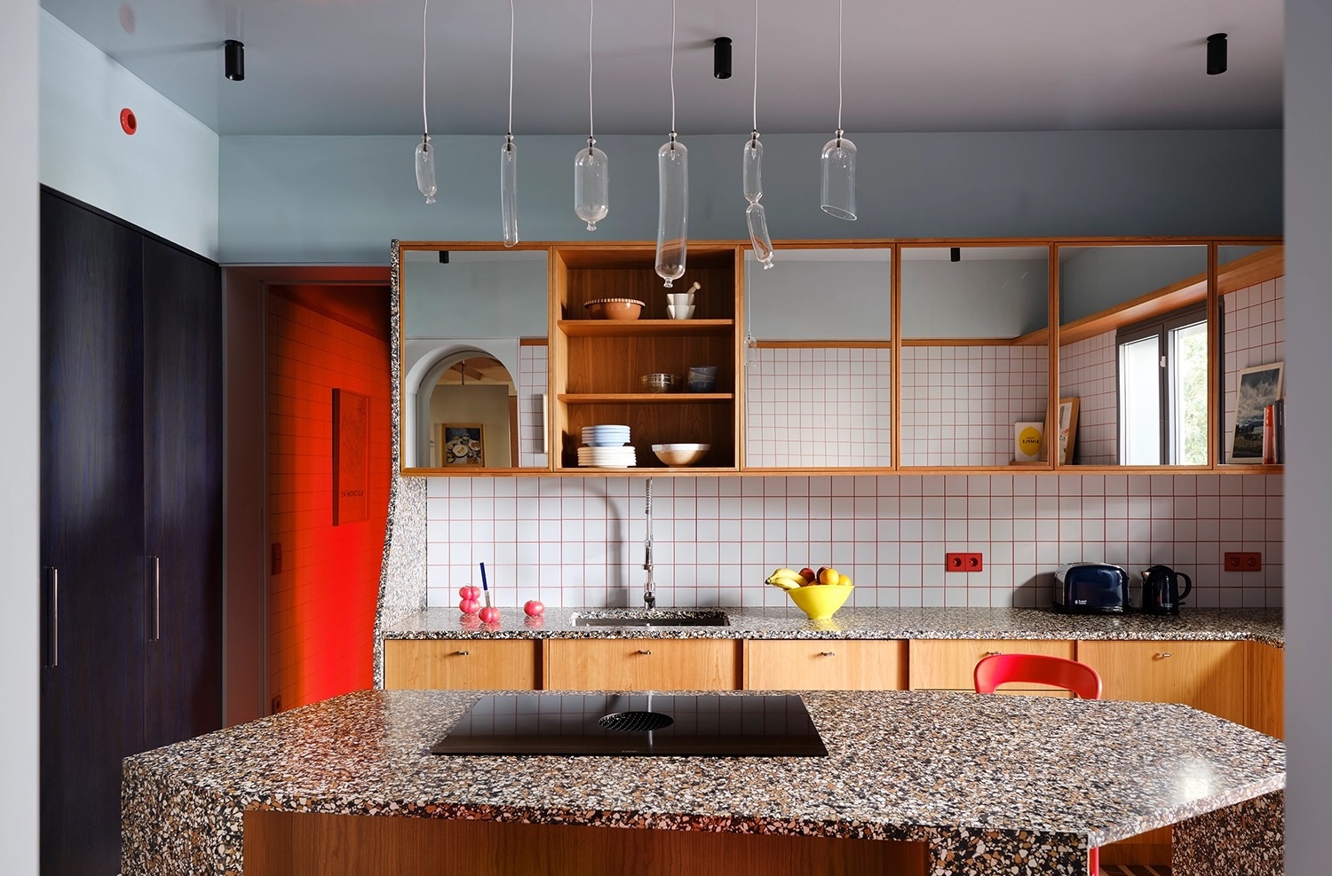 A stony blue kitchen with matching gloss ceiling
