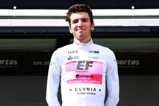 BURGOS SPAIN AUGUST 15 Sean Quinn of The United States and Team EF EducationEasyPost celebrates at podium as White best young jersey winner during the 45th Vuelta a Burgos 2023 Stage 1 a 161km stage from Villalba de Duero to Burgos on August 15 2023 in Burgos Spain Photo by Gonzalo Arroyo MorenoGetty Images