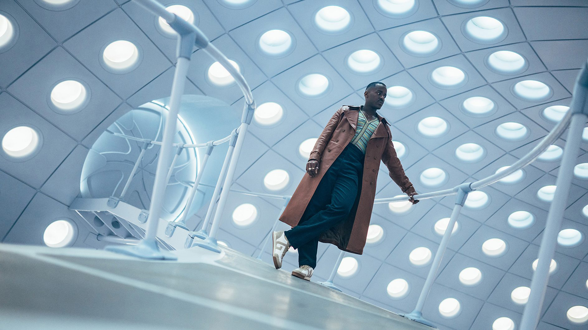 A tilted press image of Ncuti Gatwa's 15th Doctor standing in the TARDIS in Doctor Who season 14
