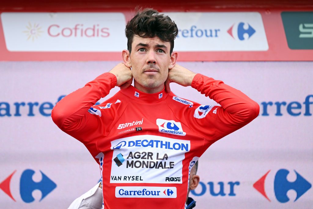 ESTACION DE MONTANA DE MANZANEDA OURENSE SPAIN AUGUST 29 Ben OConnor of Australia and Team Decathlon AG2R La Mondiale celebrates at podium as Red Leader Jersey winner during the La Vuelta 79th Tour of Spain 2024 Day 12 a 1375km stage from Ourense Termal to Estacion de Montana de Manzaneda 1491m UCIWT on August 29 2024 in Estacion de Montana de Manzaneda Spain Photo by Dario BelingheriGetty Images