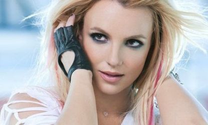 Britney Spears holds up a convenience store with a gun in her latest video, "Criminal."