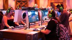 Gamers play World of Warcraft at the Gamescom 2025 convention in Germany.