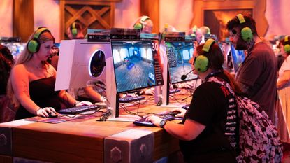 Gamers play World of Warcraft at the Gamescom 2025 convention in Germany.