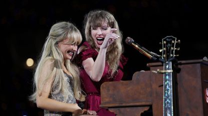 Taylor Swift and Sabrina Carpenter perform on stage at the Eras Tour