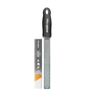 Microplane Zester Grater in Black for Citrus Fruits, Hard Cheese, Ginger, Chocolate and Nutmeg With Fine Stainless Steel Blade - Made in Usa