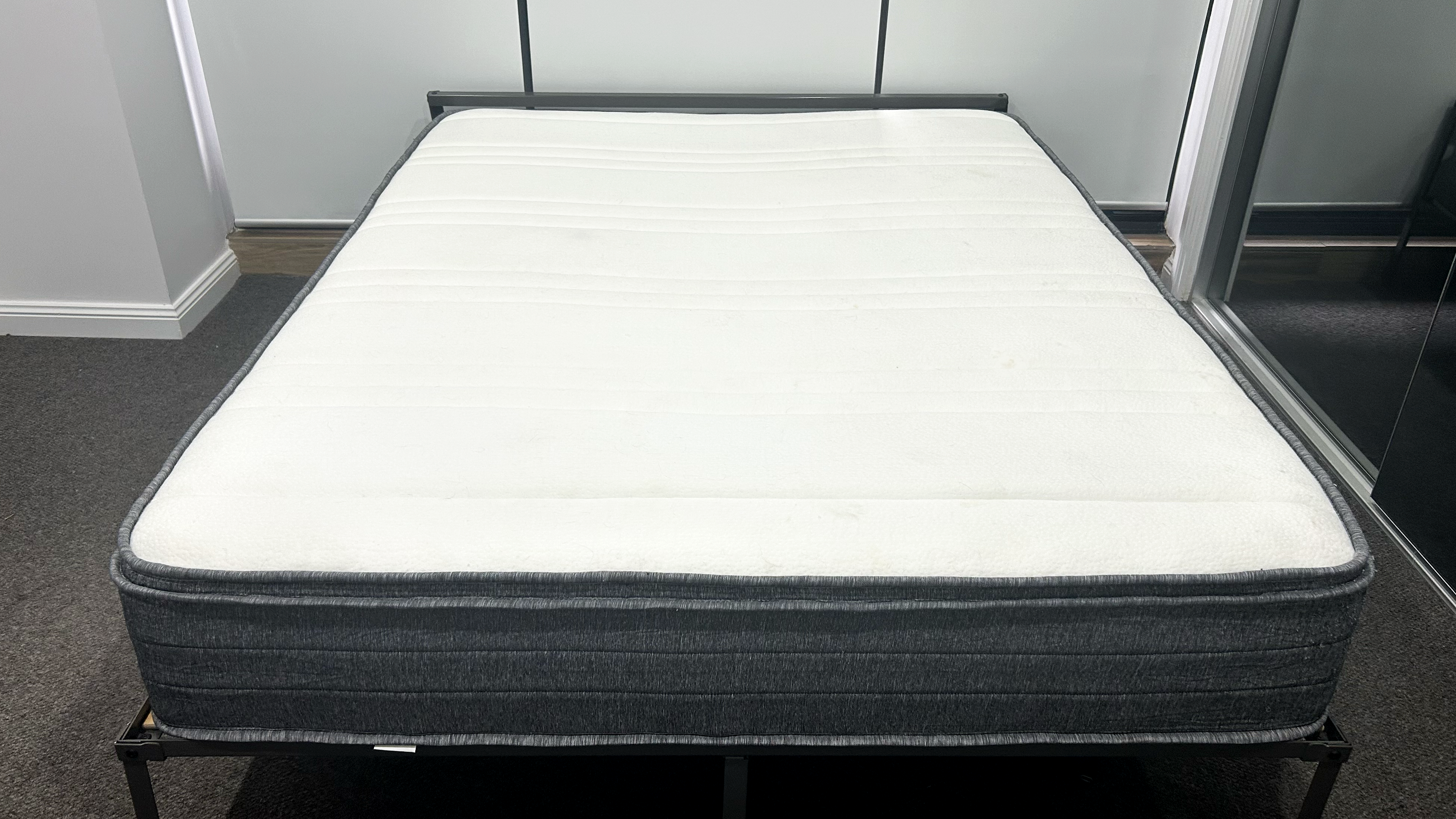 Origin Hybrid mattress on bedframe
