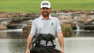 Louis Oosthuizen with the Alfred Dunhill Championship trophy