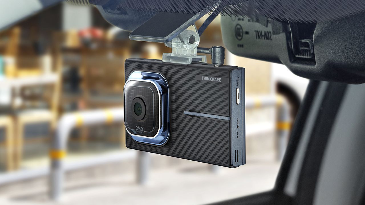 The Thinkware X1000 dash cam mounted inside a car windshield