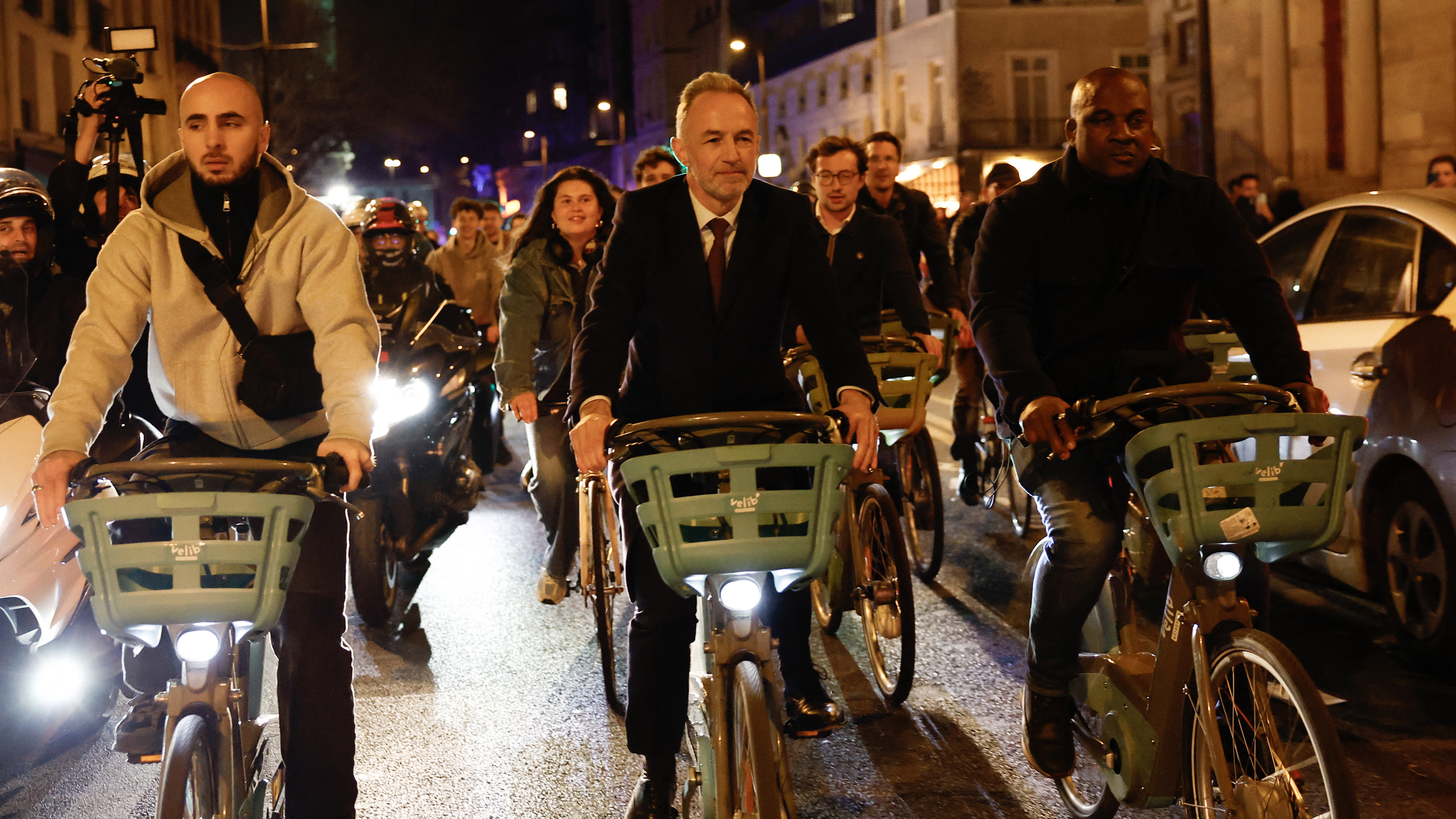 Paris mayor Emmanuel Gr&amp;eacute;goire cycling around the city