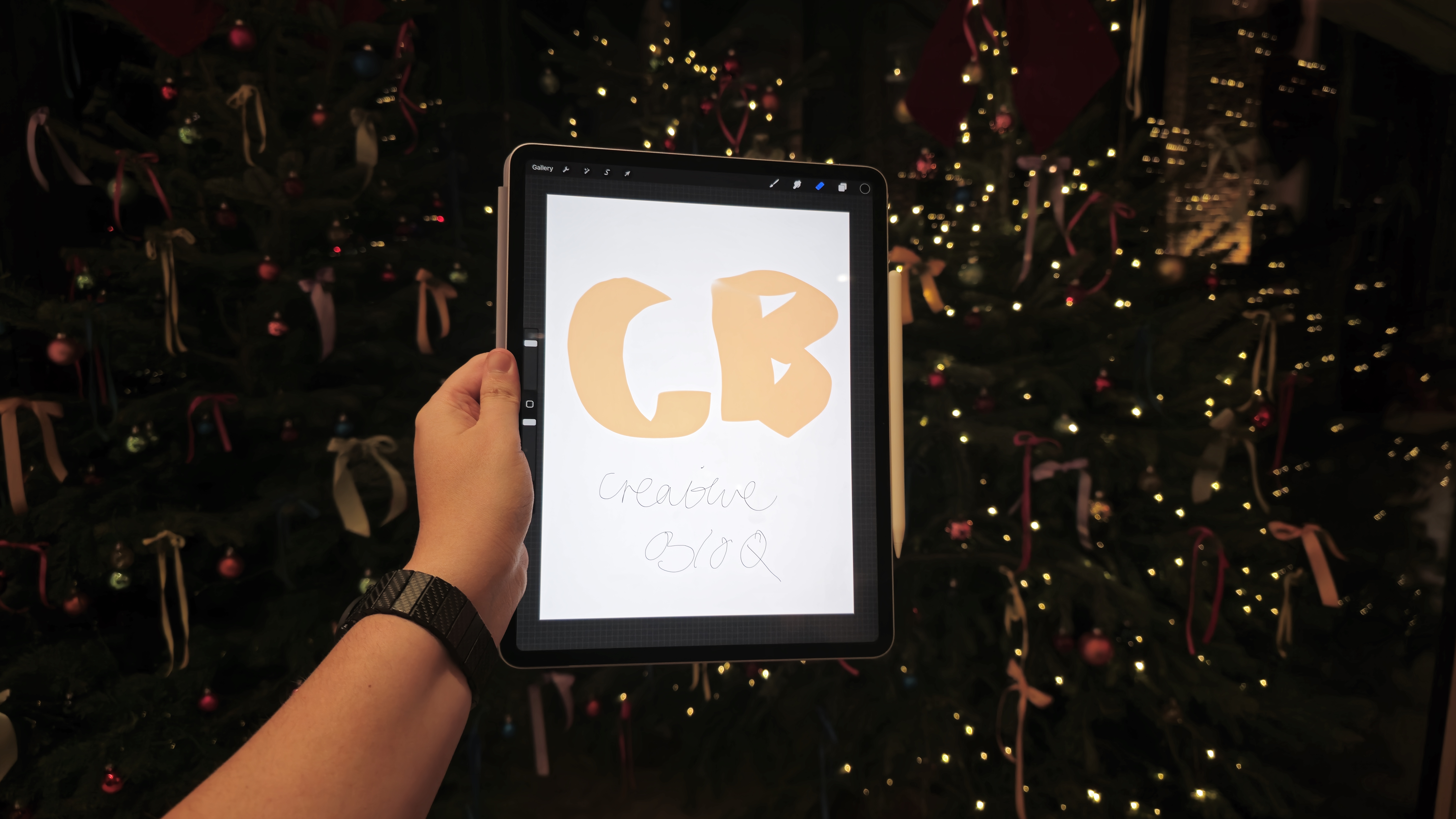 Apple event Battersea, holding an iPad Air with a CB illustration using procreate