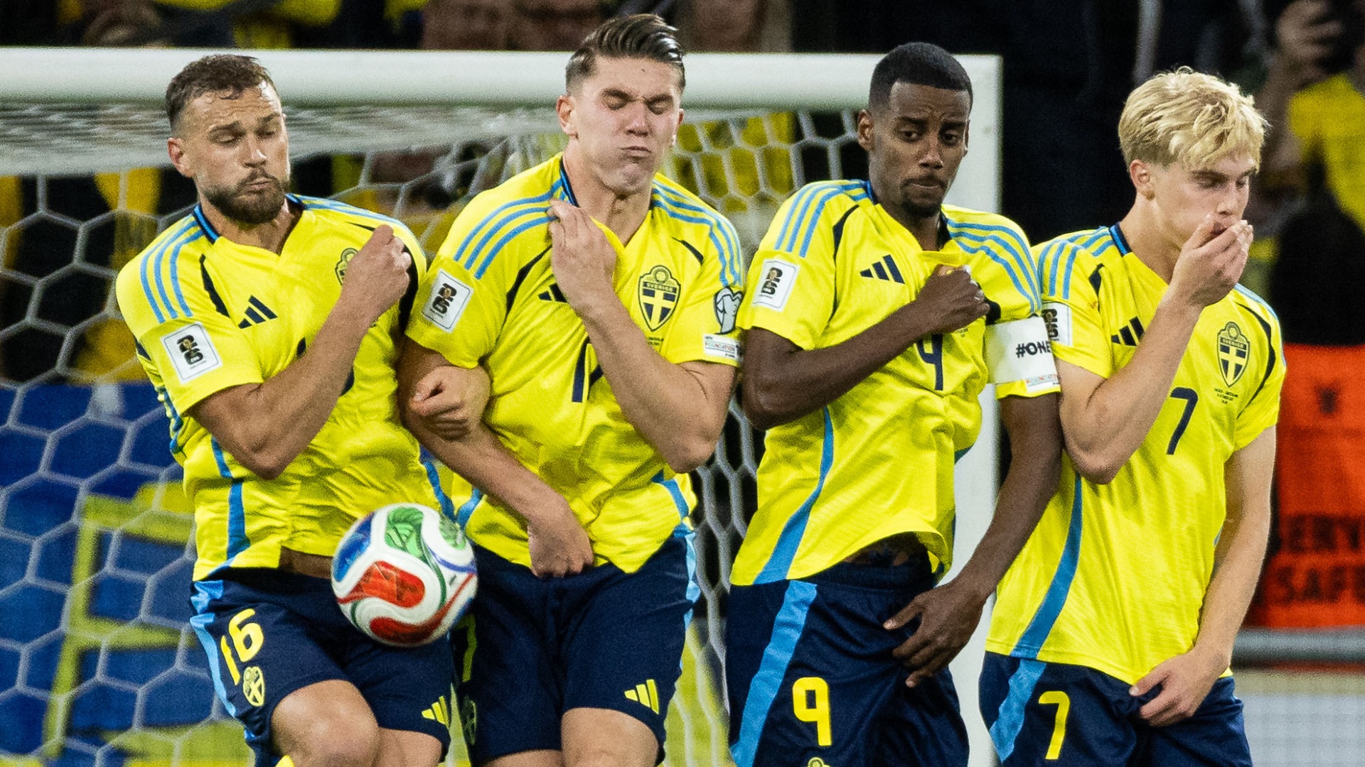 Sweden players Jesper Karlstrom, Viktor Gyokeres, Alexander Isak and Lucas Bergvall of Sweden form a wall to defend a free kick during a 2026 World Cup qualifier
