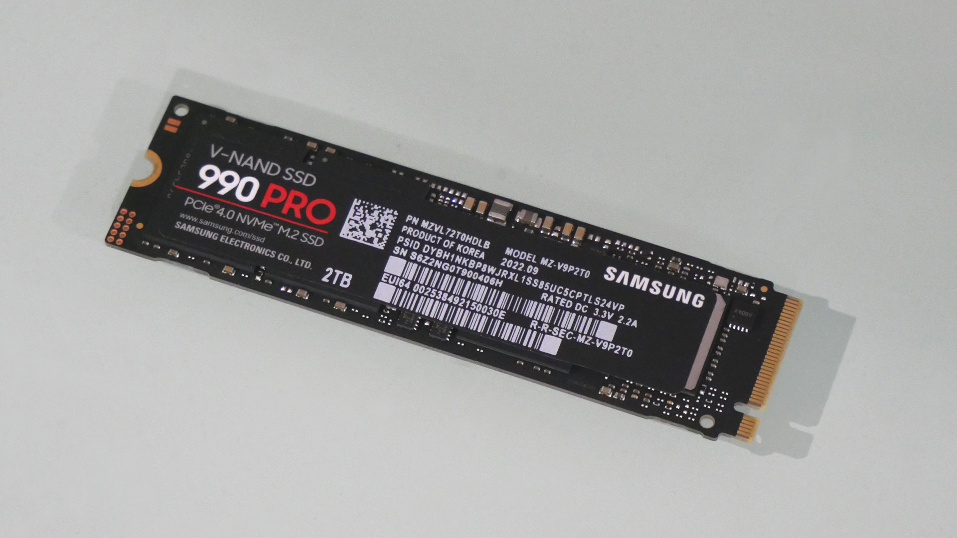 Samsung 990 Pro 2TB on a grey background
