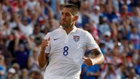 Clint Dempsey fist-bumping the air during a USMNT match.