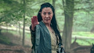 Michelle Yeoh as Scian, points forward, in The Witcher: Blood Origin