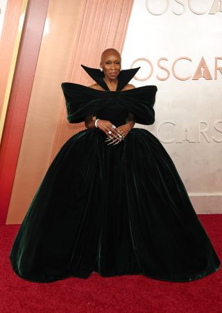 Cynthia Erivo attends the 97th Annual Oscars at Dolby Theatre on March 02, 2025 in Hollywood, California in a big deep green structured gown.