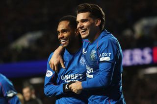 GLASGOW, SCOTLAND - JANUARY 02: Danilo of Rangers FC celebrates scoring his team's third goal with teammate Ianis Hagi during the SPL Premier League match between Rangers FC and Celtic FC at Ibrox Stadium on January 02, 2025 in Glasgow, Scotland. (Photo by Ian MacNicol/Getty Images)