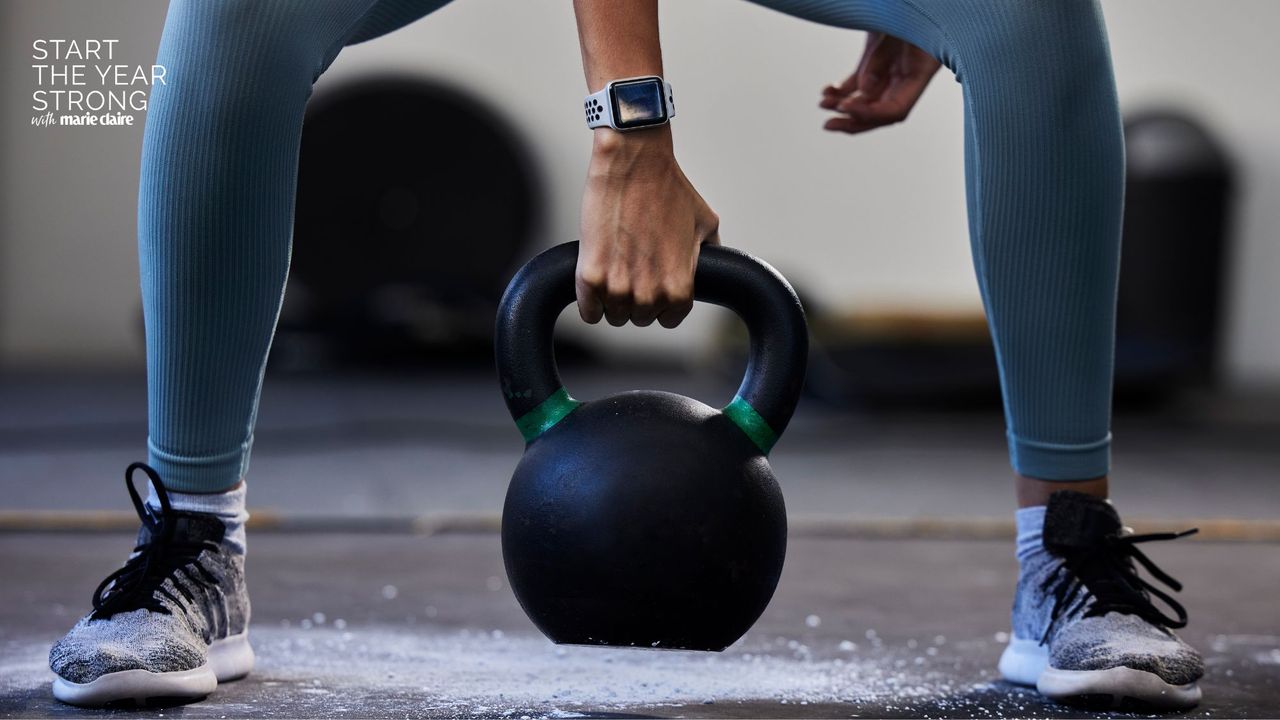 A woman doing one of the best home kettlebell workouts