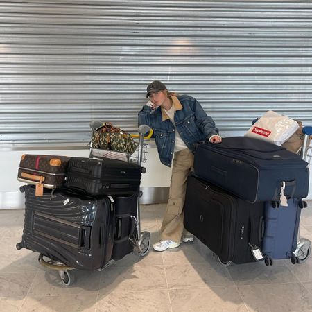 Girl with suitcases