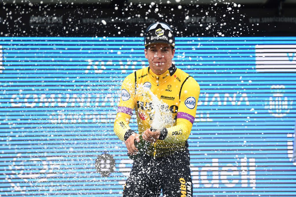 Dylan Groenwegen sprays the champagne on the podium