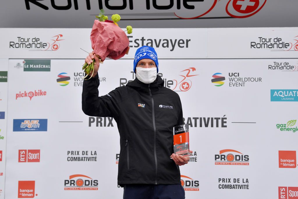 ESTAVAYER SWITZERLAND APRIL 30 Stefan Kung of Switzerland and Team Groupama FDJ Most Combative Rider celebrates at podium during the 74th Tour De Romandie 2021 Stage 3 a 1687km stage from Estavayer to Estavayer Trophy Mask Covid Safety Measures TDR2021 TDRnonstop UCIworldtour on April 30 2021 in Estavayer Switzerland Photo by Luc ClaessenGetty Images
