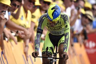 Alberto Contador lets up after crossing the finish line.