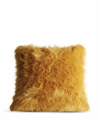 Yellow fluffy cushion from Dunelm