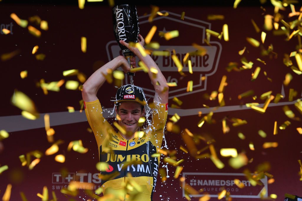 SIENA ITALY AUGUST 01 Podium Wout van Aert of Belgium and Team JumboVisma Trophy Celebration Champagne during the Eroica 14th Strade Bianche 2020 Men a 184km race from Siena to SienaPiazza del Campo StradeBianche on August 01 2020 in Siena Italy Photo by Tim de WaeleGetty Images
