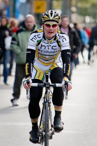 Andre Greipel on the way to the podium to receive another trophy for his collection.