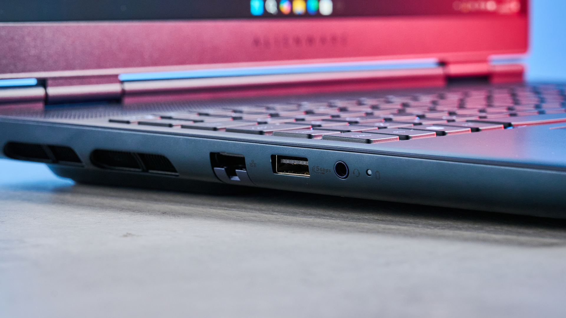 A blue Alienware 16X Aurora gaming laptop