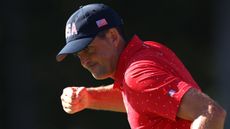 Keegan Bradley celebrates a putt during the Presidents Cup