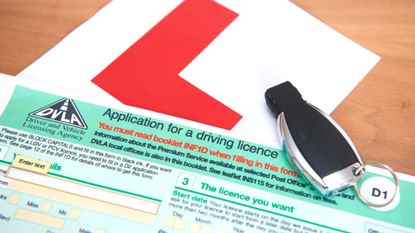 A photo illustration of a DVLA application form for a UK driving licence