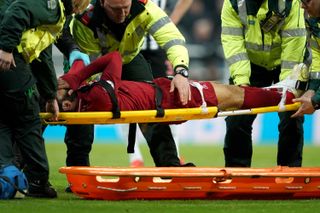 Mohamed Salah was carried off on a stretcher against Newcastle