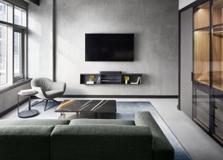 grey TV room with wooden cabinets in the Poliform Penthouse design in Gansevoort Meatpacking in Manhattan New York