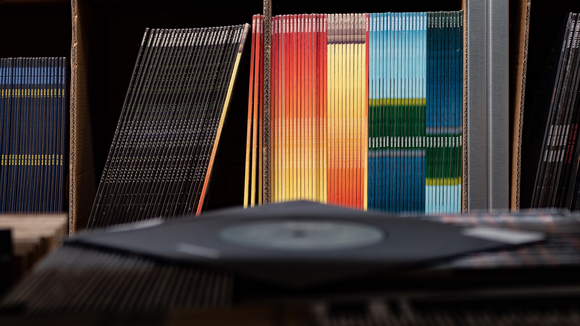 Vinyl on a shelf in a distribution warehouse.