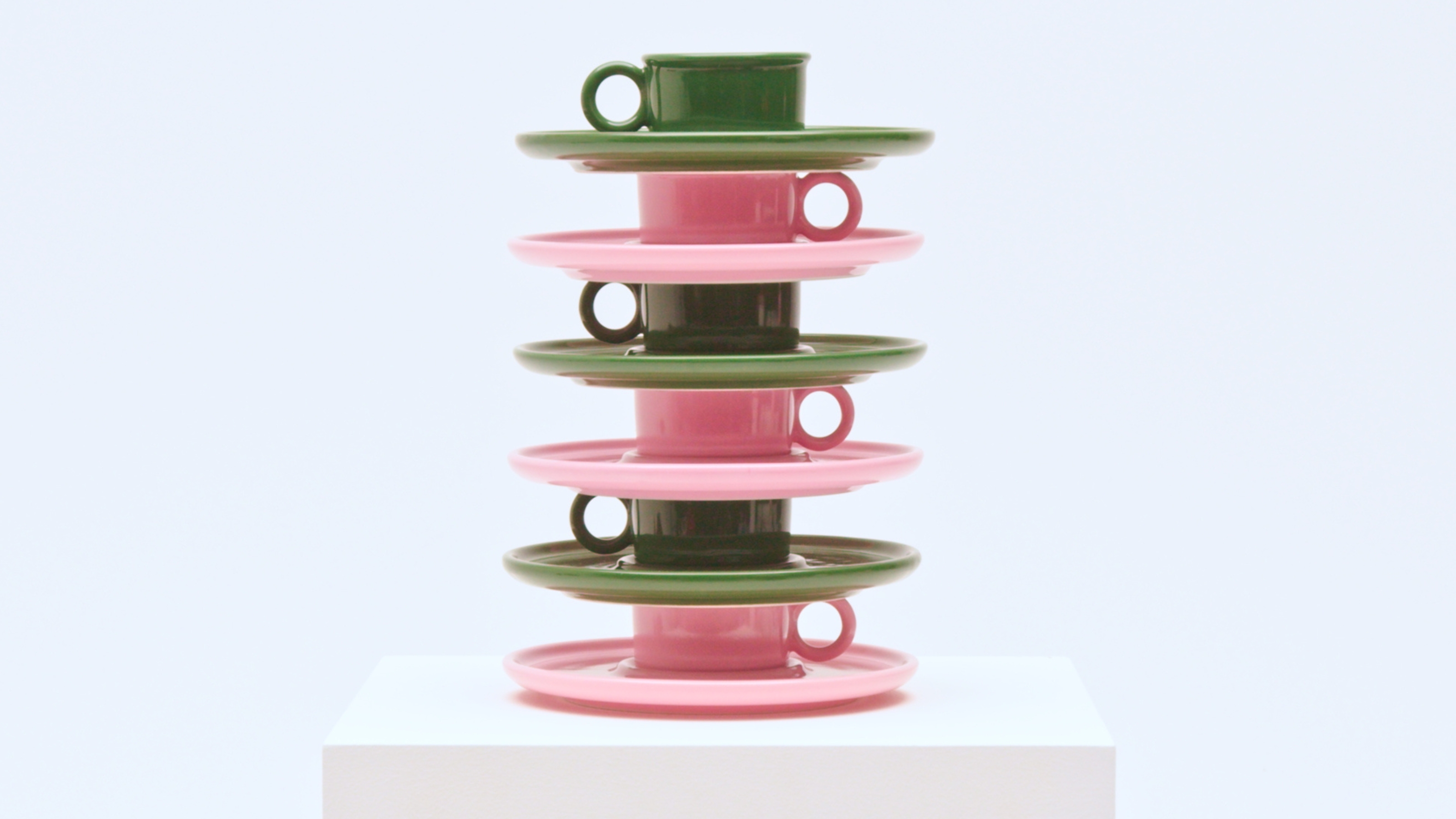 ikea and gustaf westman cup and saucers stacked in pink and green
