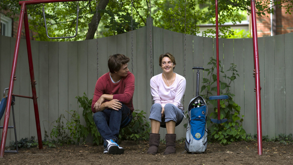 A still from the movie The Fault In Our Stars in which Shailene Woodley as Hazel Grace Lancaster and Ansel Elgort as Augustus 