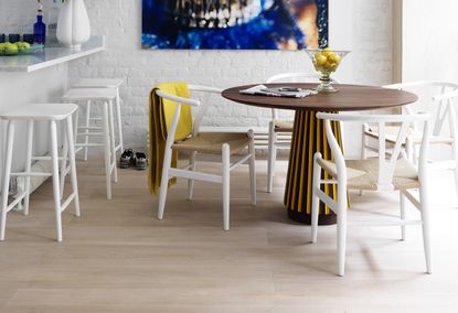 modern kitchen with blonde wood floor