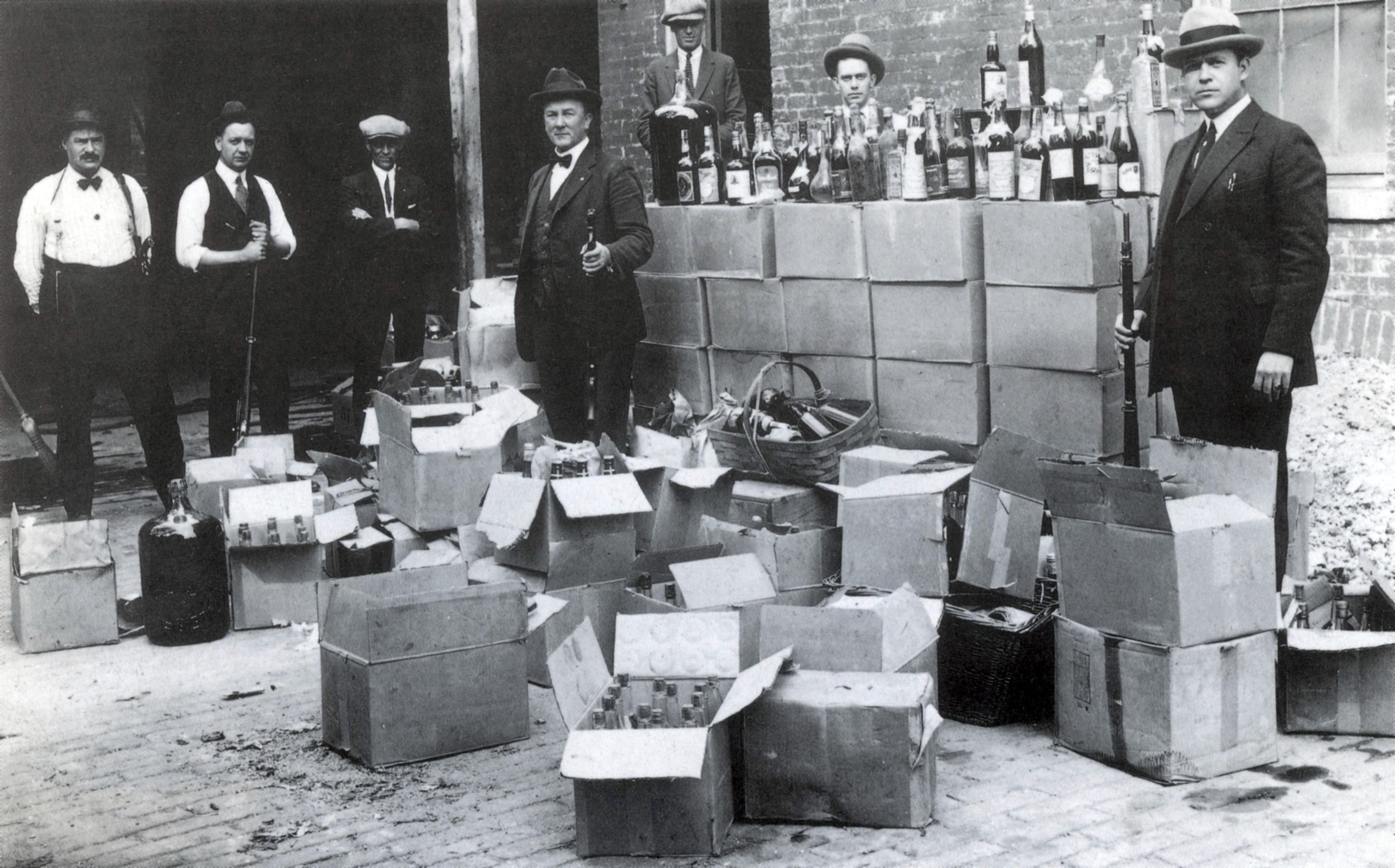 prohibition agents with confiscated liquor