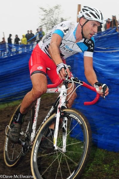 Christian Heule (Cannondale p/b Cyclocrossworld) following Johnson at the foot of the steps