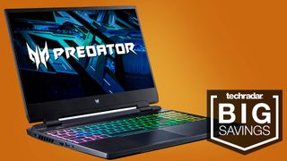 gaming laptop with rgb lit keyboard against orange background