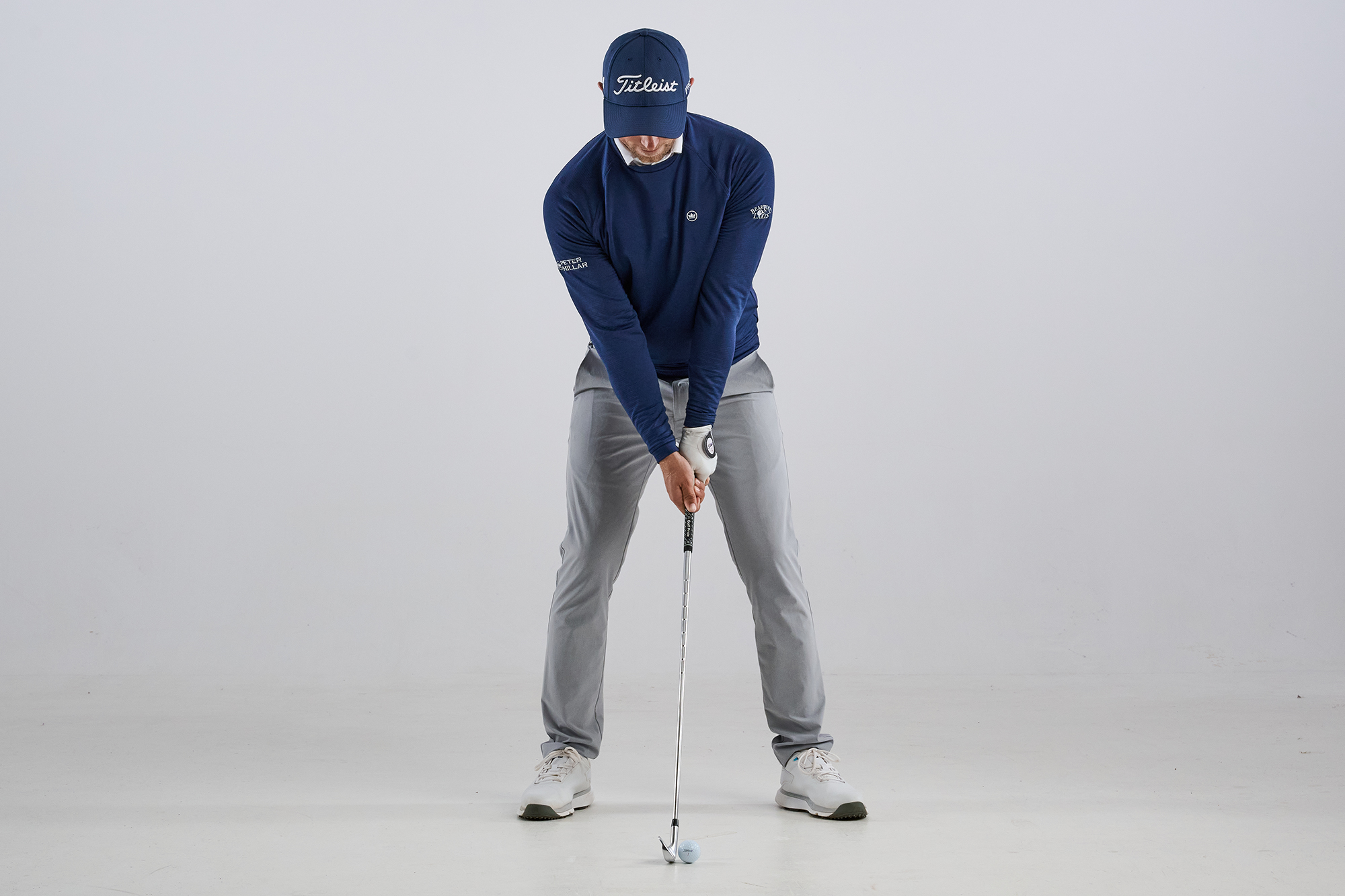 Alex Buckner with pressure central at address