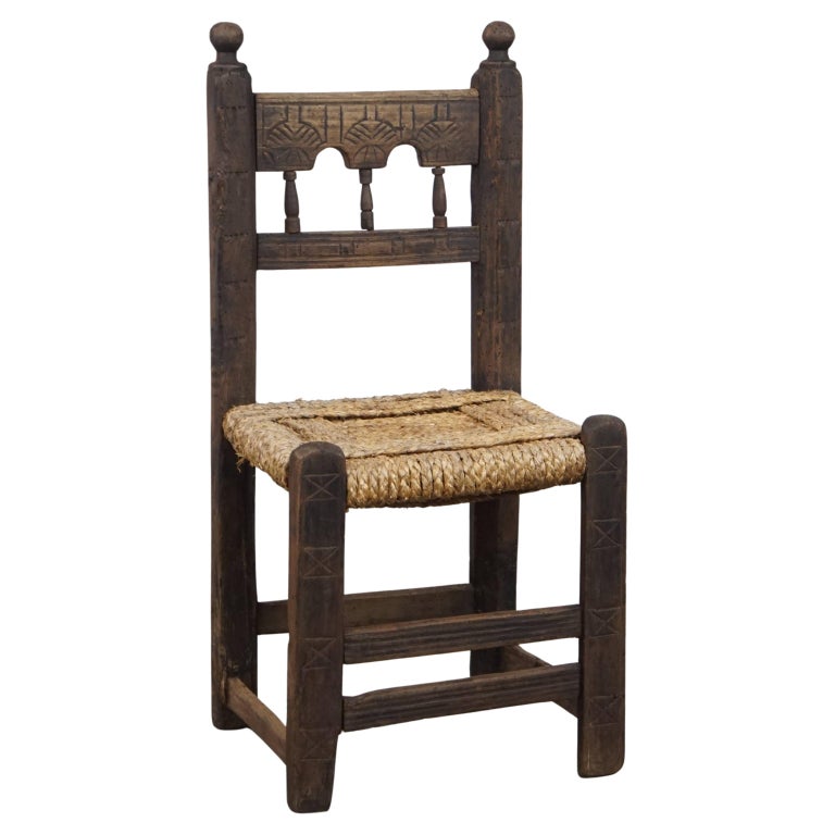 Elegant Antique Country Chair With Rope Seat and Decorative Carving