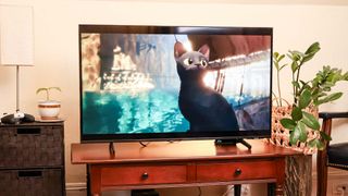 Samsung DU8000 LED TV on console in living room