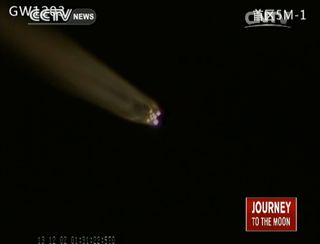 A Chinese Long March 3B rocket streaks toward space carrying China's first moon rover Yutu (Jade Rabbit) on the Chang'e 3 lunar landing mission from the Xichang Satellite Launch Center on Dec. 2, 2013 local time (Dec. 1 EST) in this still image from a CCT