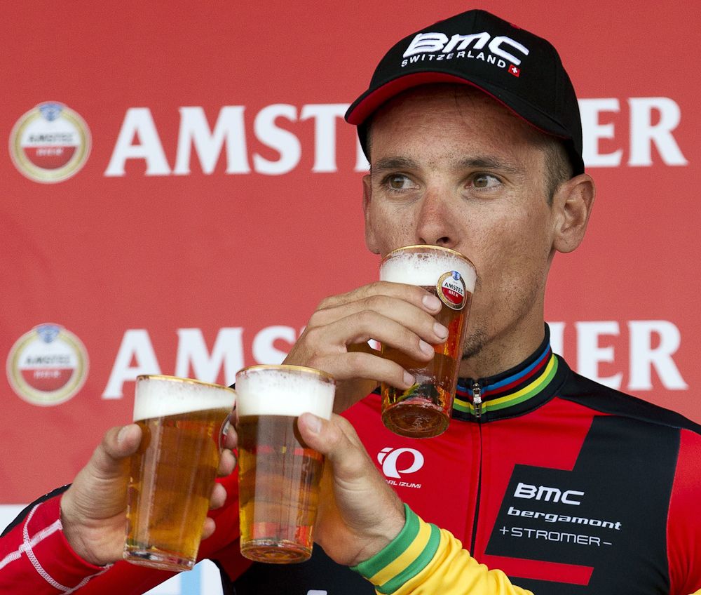 Philippe Gilbert celebrates his 2014 win with a frosty beverage