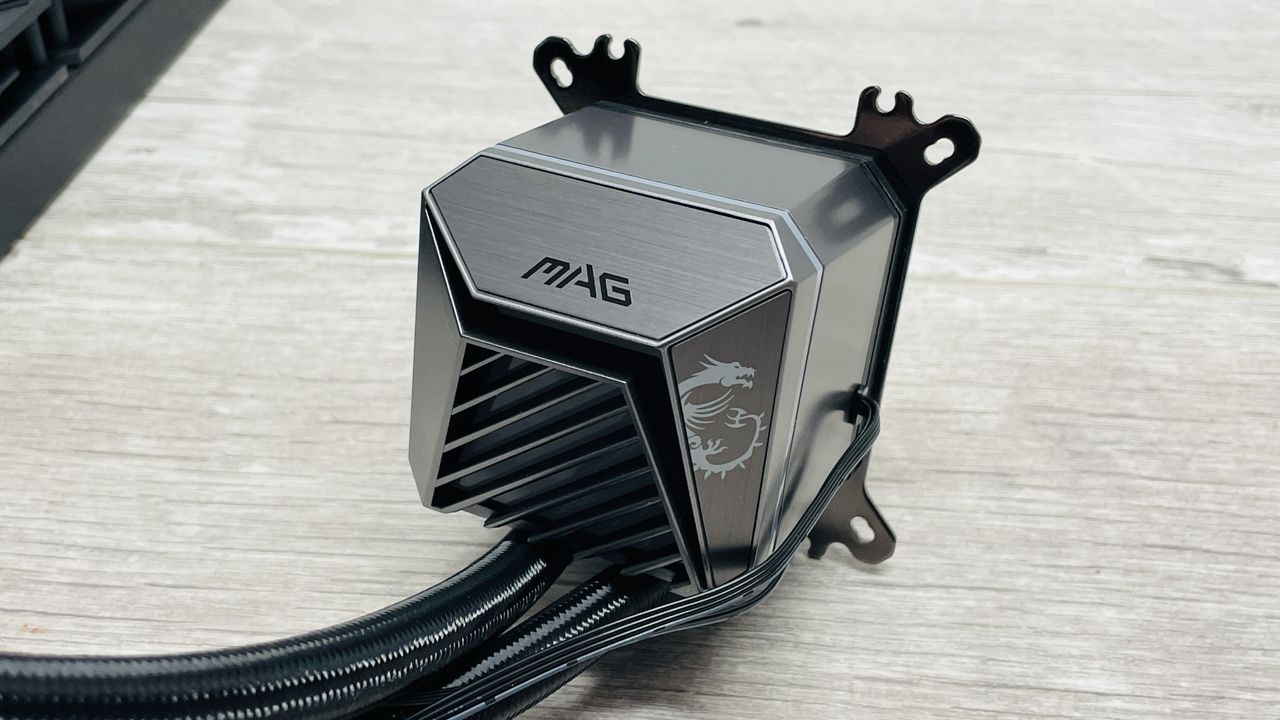 MSI MAG CoreLiquid A15 360 AIO CPU cooler pump on desk