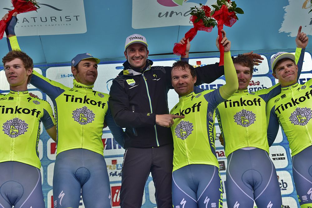 Tinkoff director Ivan Basso on the podium with his winning team after the team time trial at Tour of Croatia