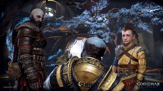 Kratos and Atreus on either side of screen look toward a blue dwarf whose back is to the camera