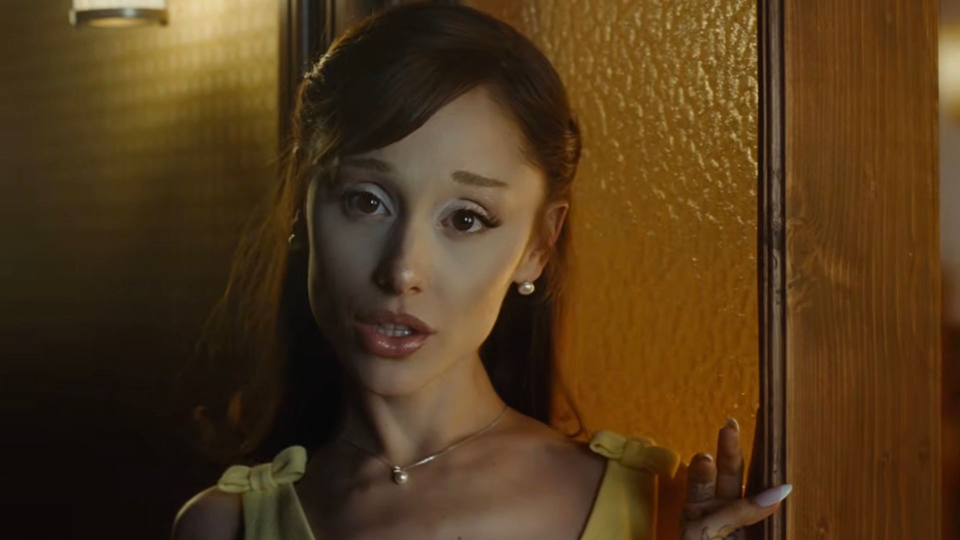 marieclaire.com - Meguire Hennes - Ariana Grande's Music Video Dress Squeezes More Juice Out of the Lemon Yellow Trend